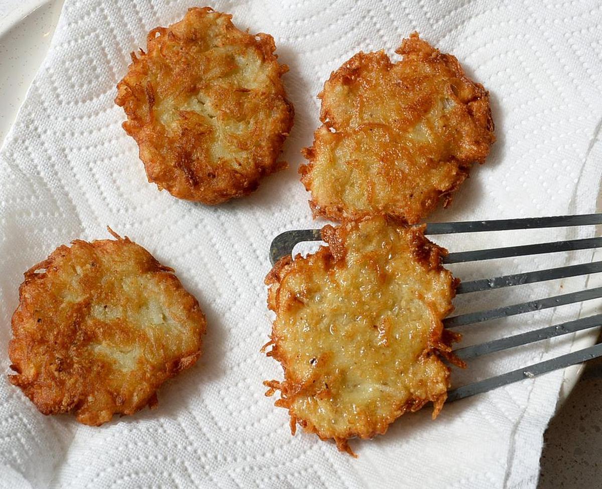 The most traditional latkes are simply grated potato, lightly fried and drained.