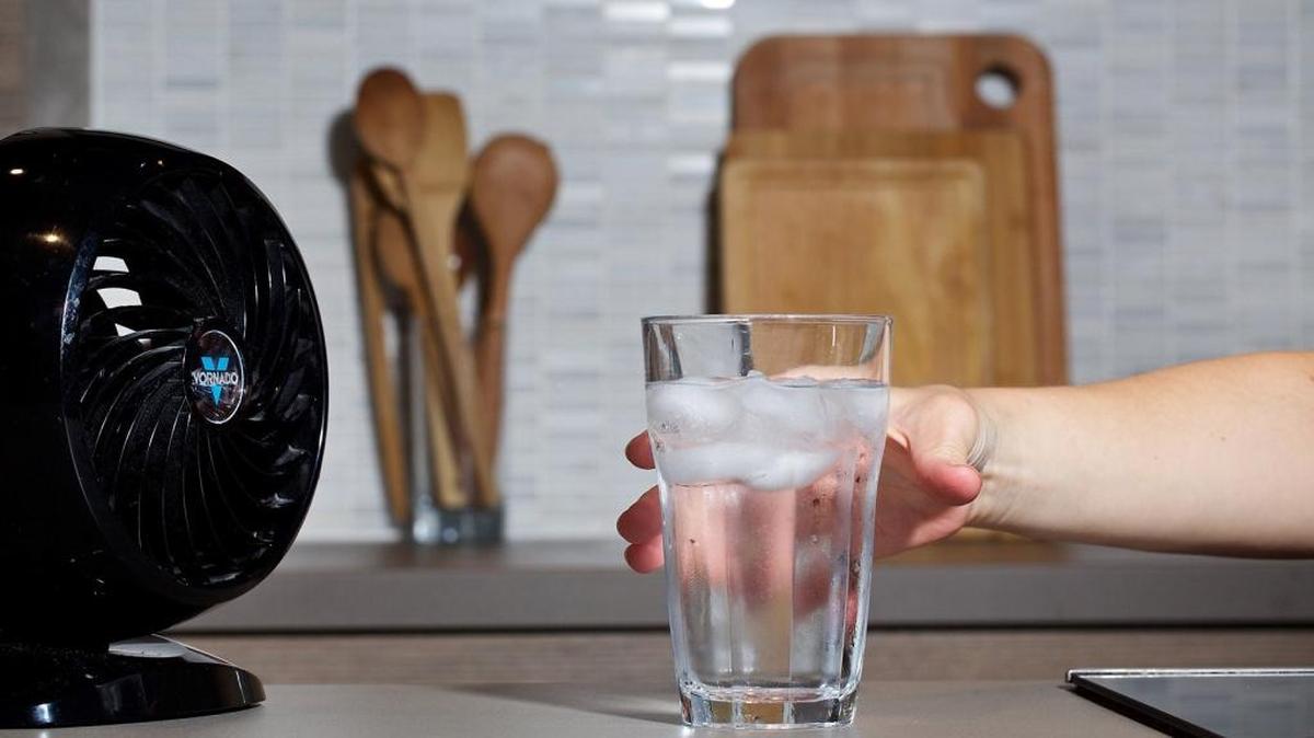 Staying hydrated and getting the air moving in your kitchen are two easy ways to keep your cool when it feels too hot to cook. MUST CREDIT: Photo by Deb Lindsey for The Washington Post.