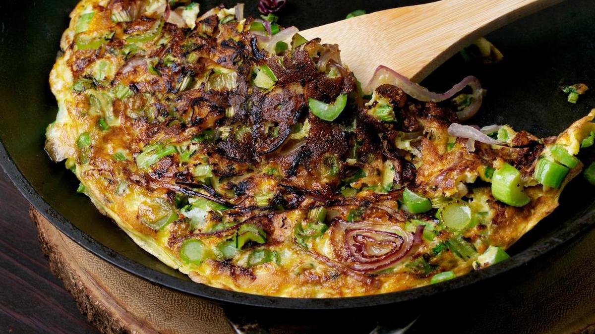 Egg Foo Yong With Greens and Onion.