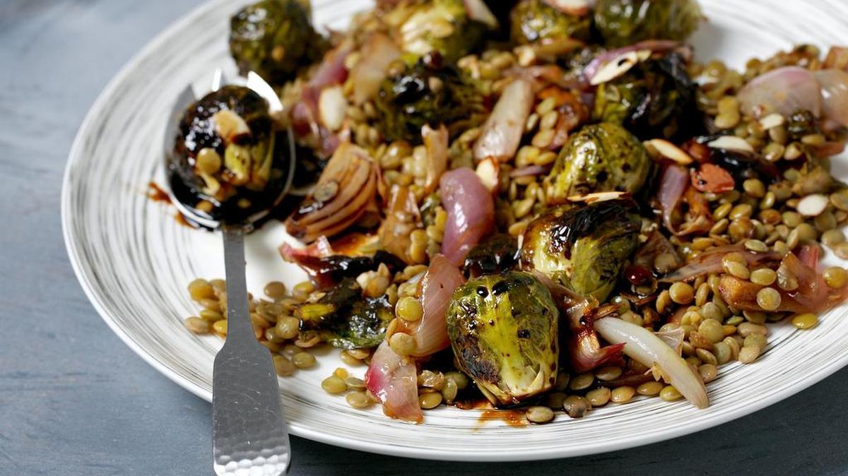 Caramelized Brussels Sprouts and Lentil Salad get best of sweet, savory and roasted.