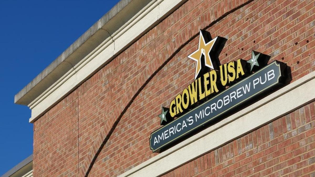 Growler USA also features a small menu with elevated takes on pub classics like wings, sliders and nachos. There are a variety of salads, sandwiches and entrées as well.