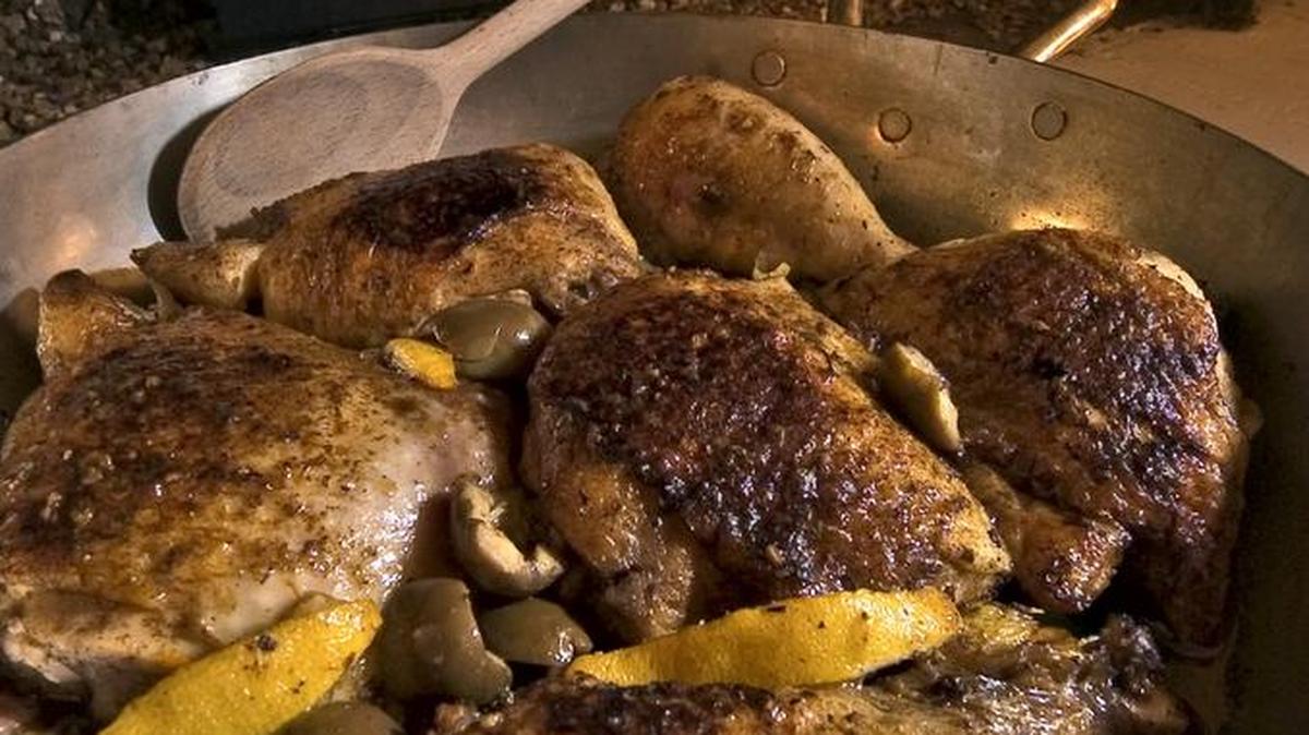 Braising with preserved lemon and green olives gives it a Moroccan profile.