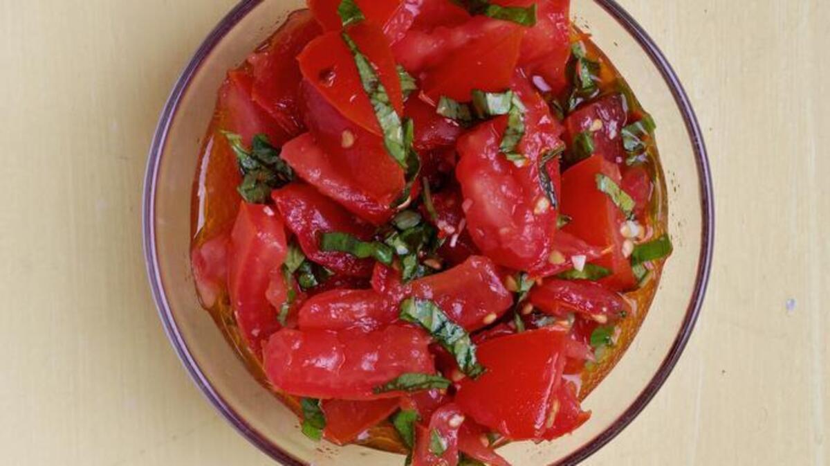 Garlicky marinated tomatoes with two variations.
