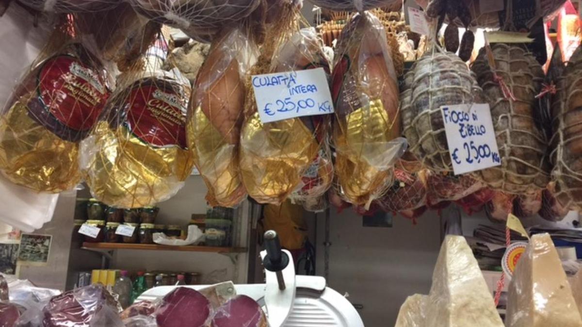 Cured hams and aged cheeses at Florence’s Mercato Centrale. Many vendors will put together a sample plate for a couple of euros.