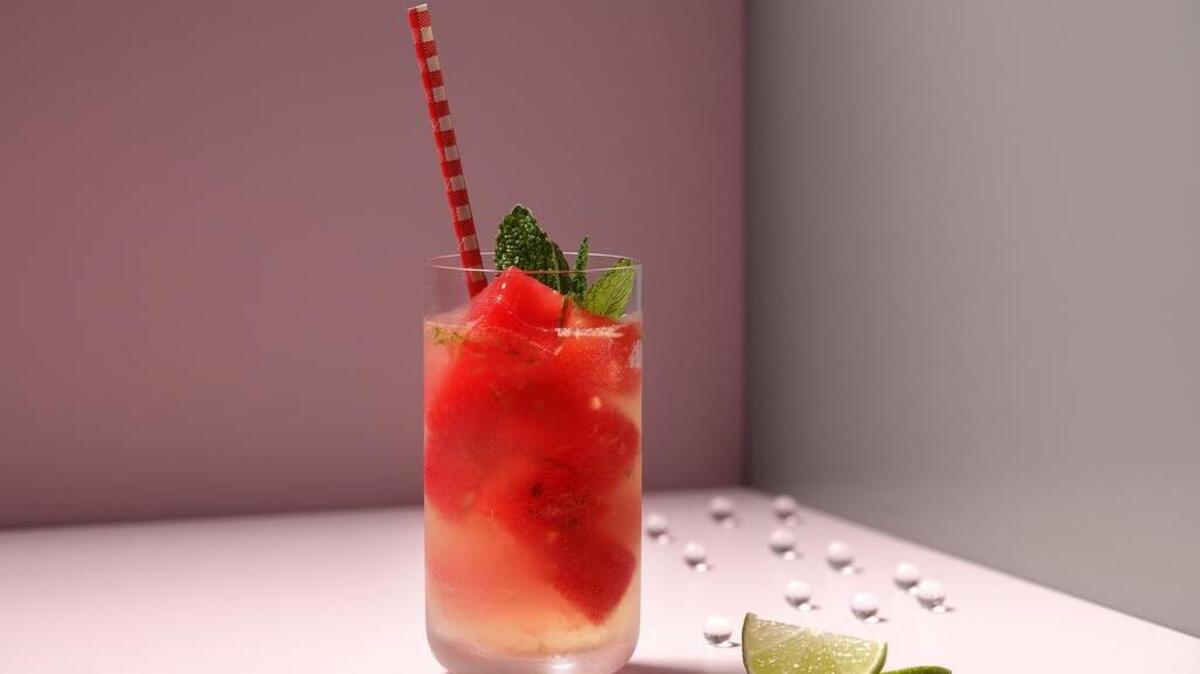 The beauty of watermelon cubes is that they chill your drink without diluting it. Here they give color to a refreshing homemade limeade.
