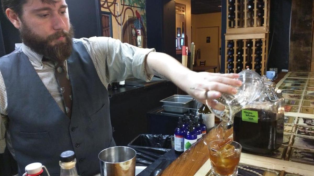 Since Heirloom restaurant uses only N.C.-made ingredients, bartender Kel Minton makes infusions to add to the ingredients he can use in cocktails.
