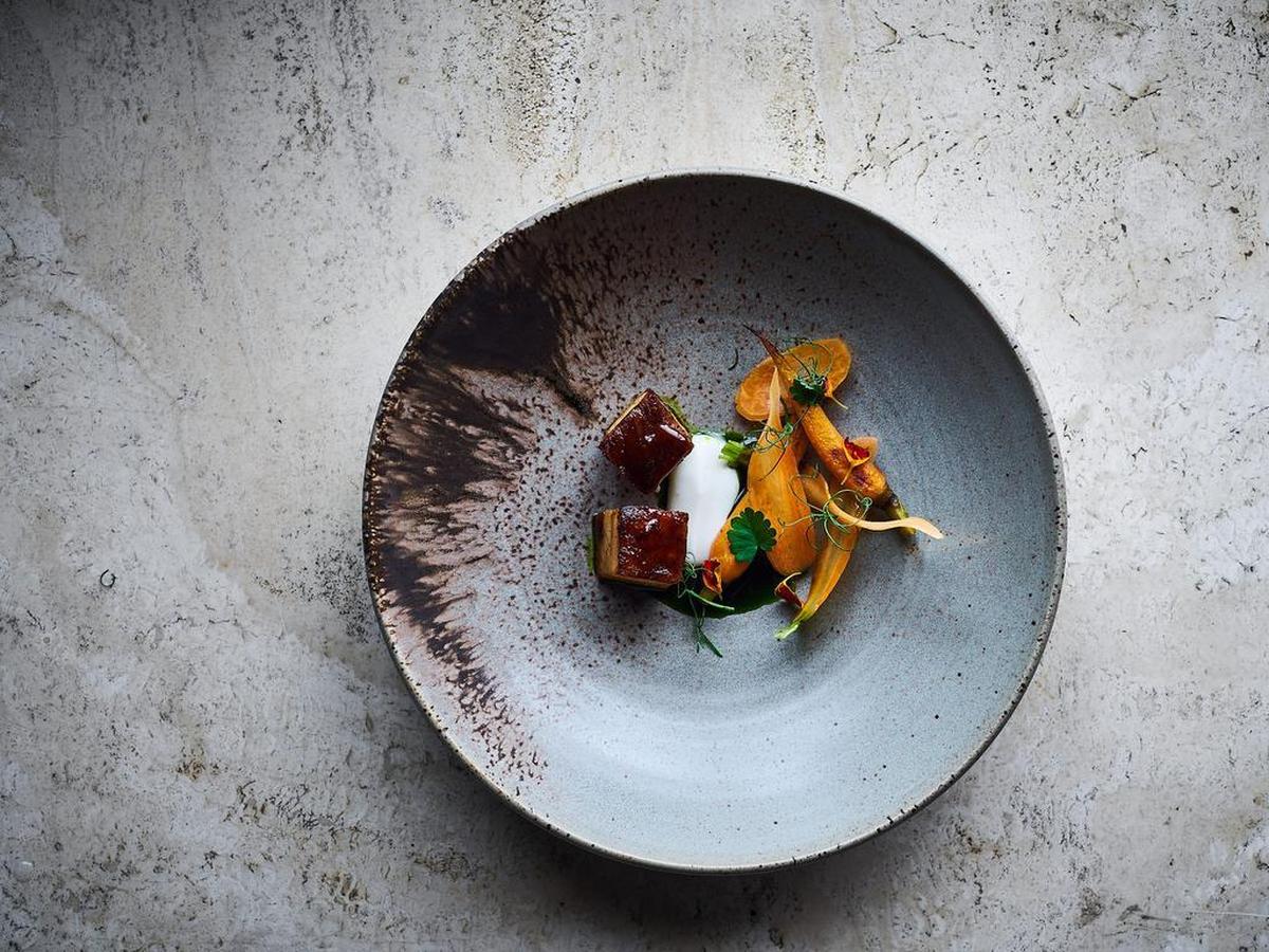 Crispy pork belly with sorghum