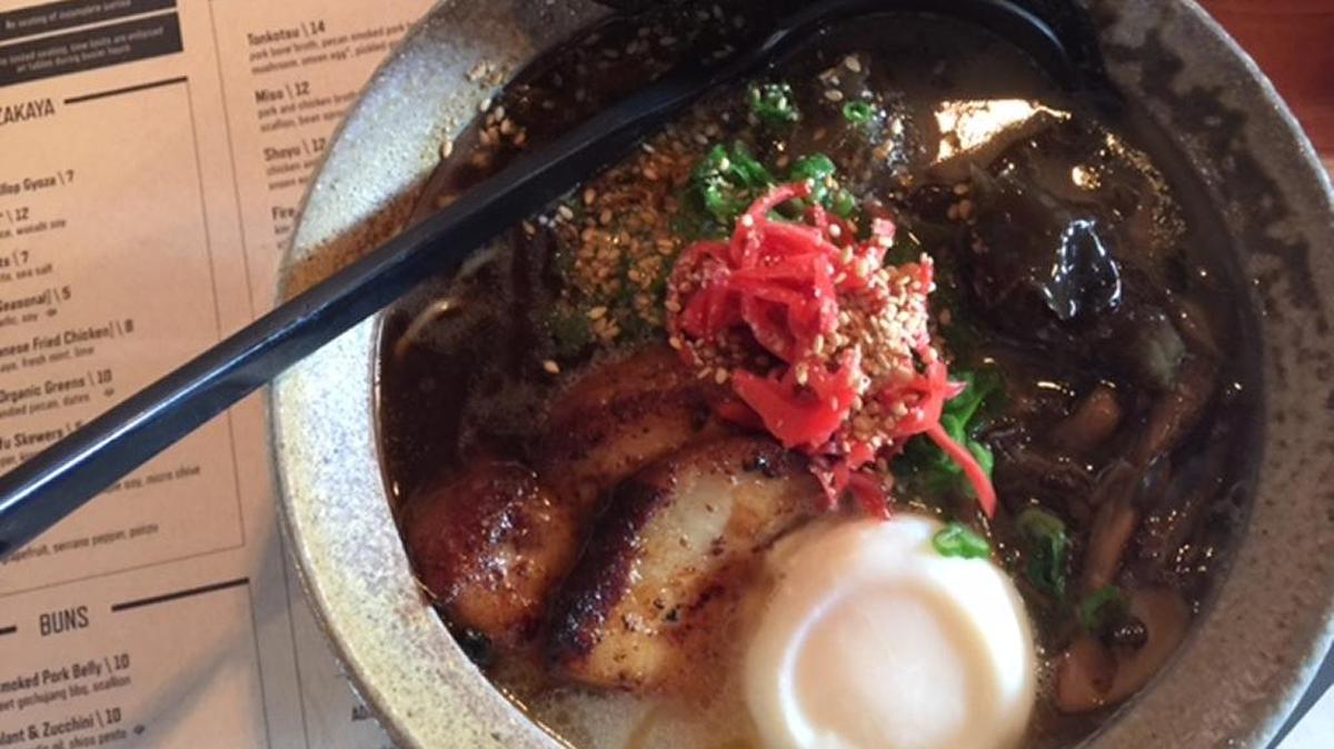 Futo Buta’s tonkotsu ramen features a long-cooked broth made from pigs feet, a runny egg and slices of pork belly.
