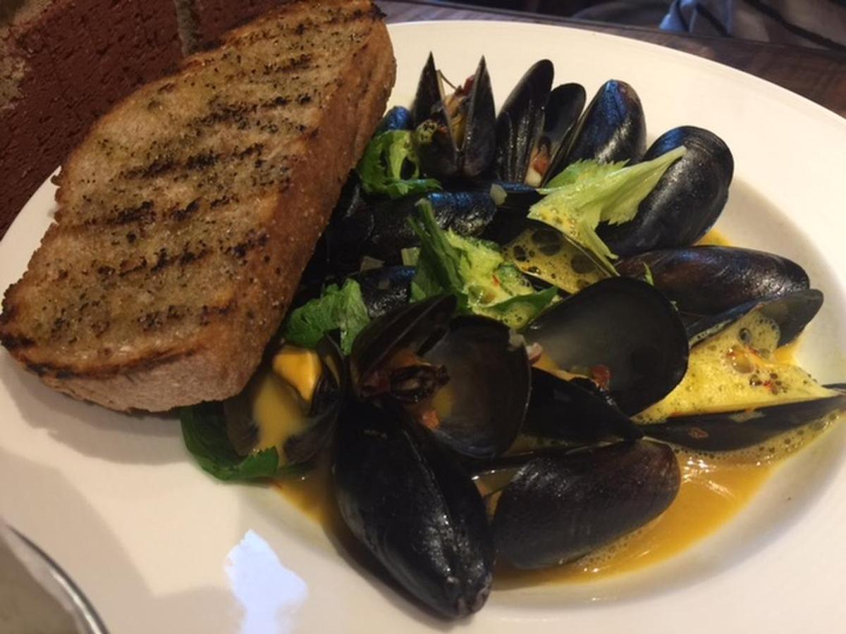 Oh, those mussels: You’ll need a spoon and you’ll want at least one more slice of bread to do justice to that smoky saffron/chorizo sauce.