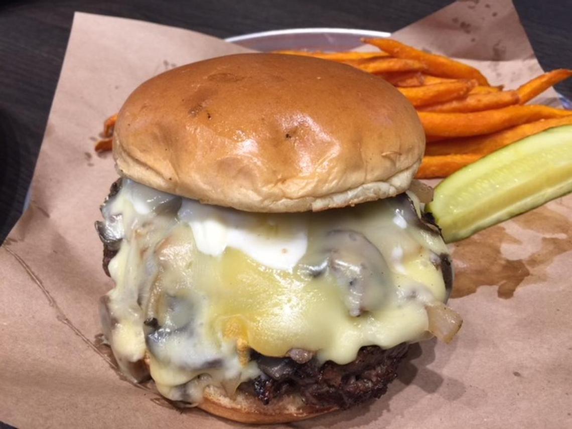 World of Beer features several beer, including the Chimay, topped with a brie-like cheese made by the same Trappist monks who make the beer, caramelized onions, mushrooms and garlic aioli.