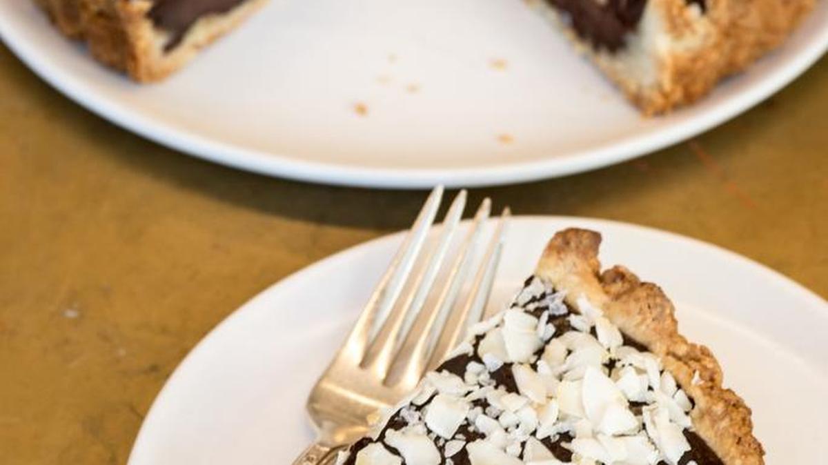 You can follow the recipe for a chocolate tart and then change it up by topping it with sea salt and toasted coconut.