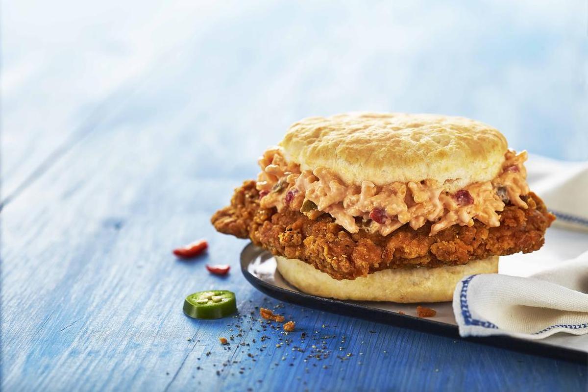 Yes, that’s a spicy chicken biscuit with Palmetto’s jalapeno pimento cheese. Photographer: Bill Lusk