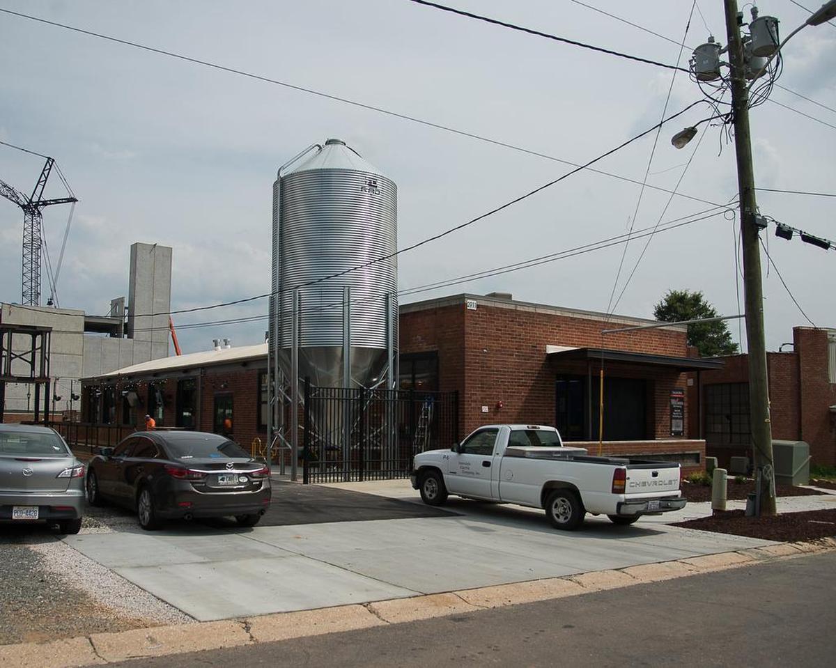 A grain silo marks the outside of Hyde Brewing on Griffith Street, across the street from Triple C.