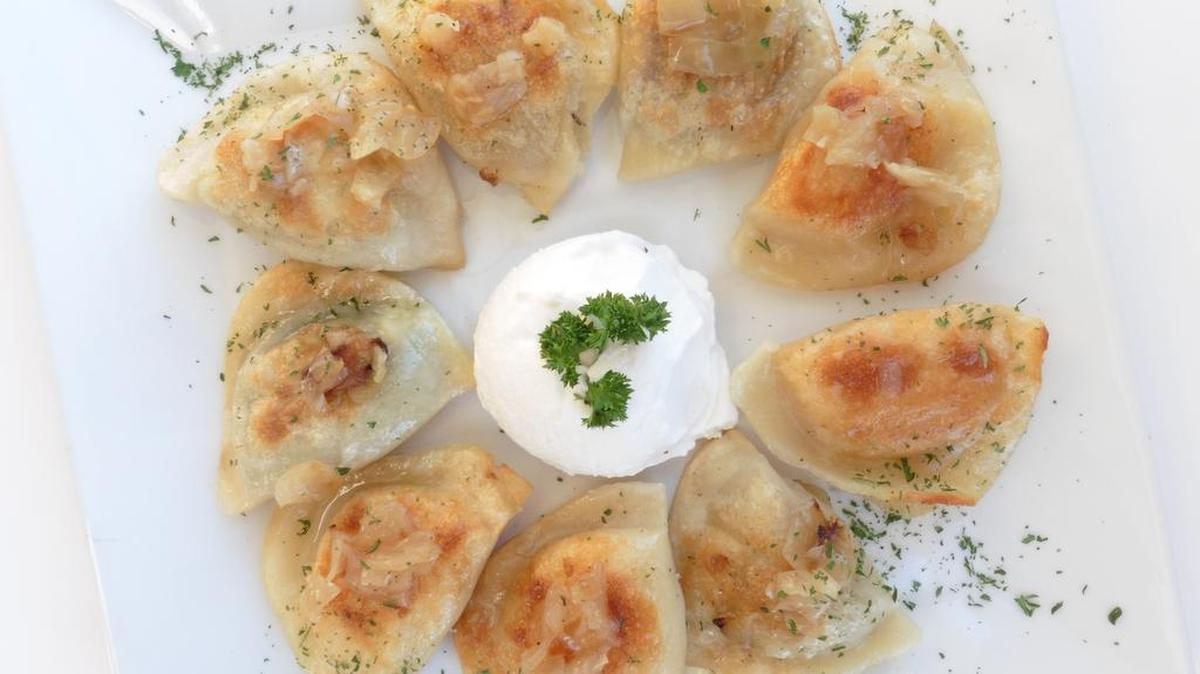 Pierogi at Taste of Europe in Charlotte came in several varieties, usually topped with onion.