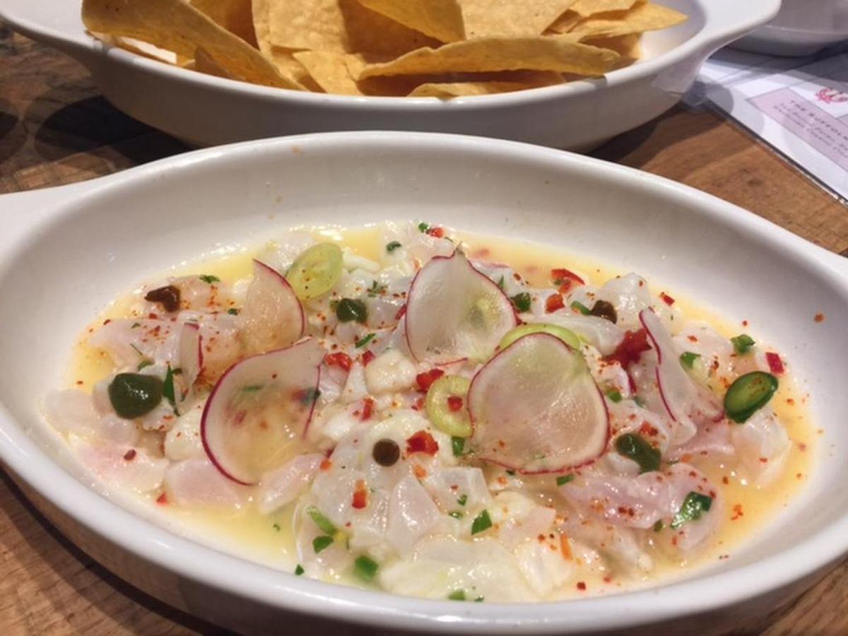 Ceviche made with N.C. grouper hits all the right notes of heat, cold and citrus. It comes with a bowl of crisp tortilla chips.