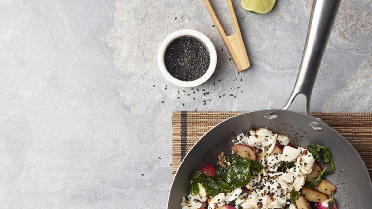 Stir-Fry radish with crab and black sesame seeds.