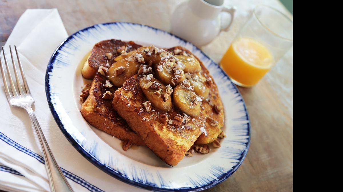 
BLT Steak’s French toast is topped with caramelized bananas. 
