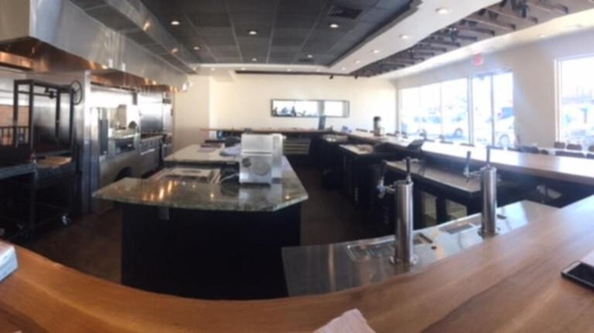 Bar’s-eye view: Flourshop will have all of its cooking right in the middle of the restaurant when it opens by Feb. 1.