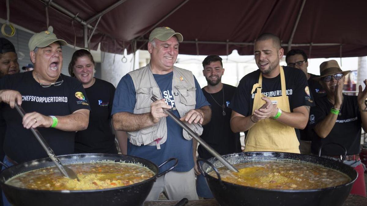 FILE - Jose Andres, a chef, stirs a giant paella pan during a food relief effort following Hurricane Maria in San Juan, Puerto Rico, Oct. 19, 2017. Andrés created a new model for providing direct relief through cooking. (Eric Rojas/The New York Times)