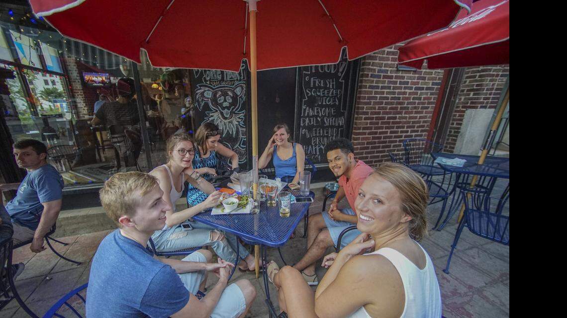 
Before walking over to BB&T BallPark to watch the Charlotte Knights, families and young adults are stopping in at Brevard Court. 
