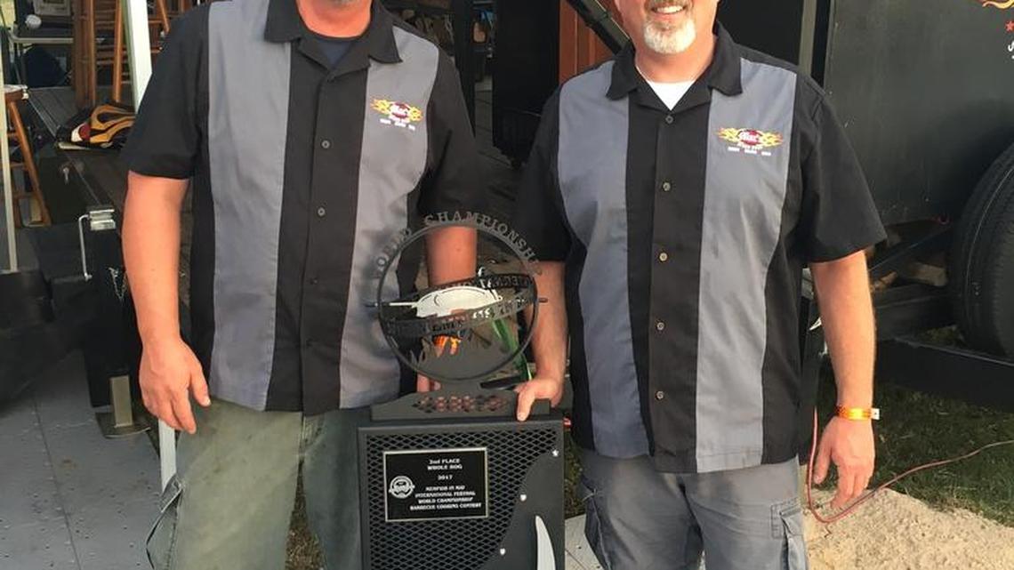 Mac’s chef Kevin Kuruc (left) and teammate Jeff Delmastro brought home a trophy from Memphis in May.