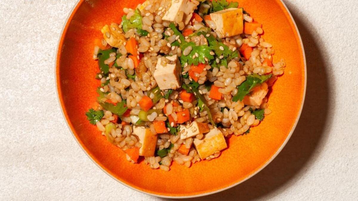 Brown Rice Salad With Carrots, Scallions and Baked Tofu.