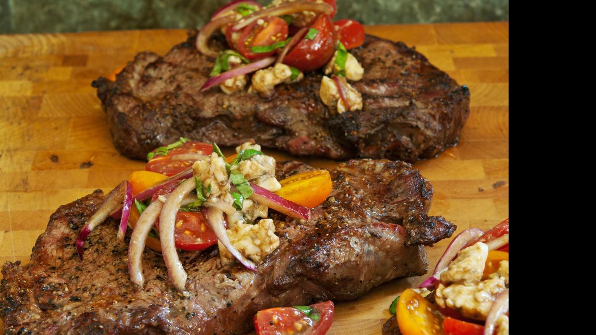 
New York Strip with Summer Tomato and Blue Cheese “Salsa.”
