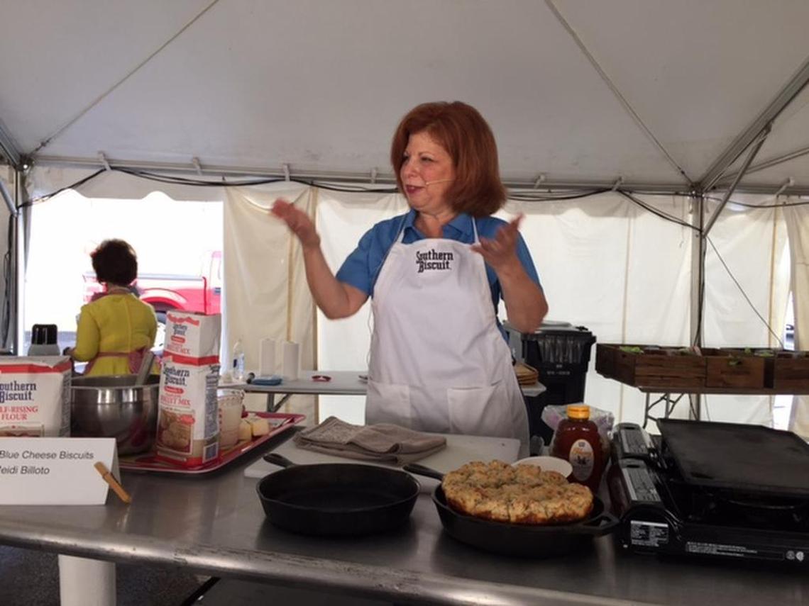Heidi Billotto did a biscuit-making demonstration with the maximum number of N.C. products she had hauled to Knoxville.