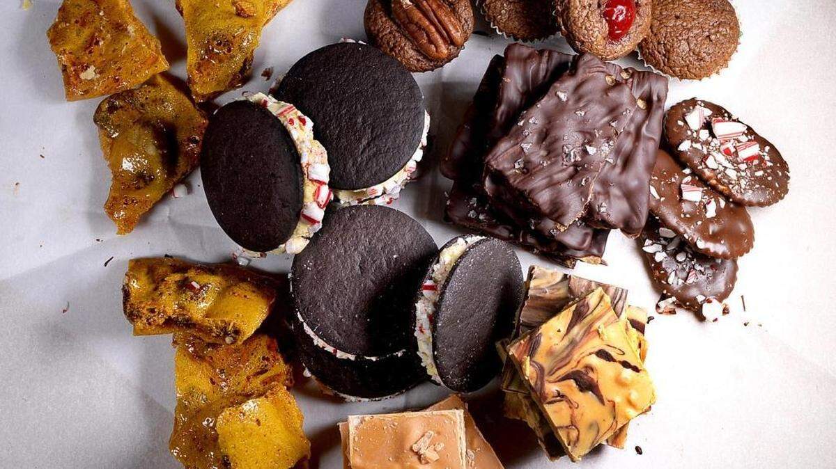 So simple (clockwise from upper left): Microwave pecan brittle, Nutella Brownie Bites, Sweet and Salty Thin Mints, Tiger Butter, Butterscotch Bark, Chocolate Peppermint Sandwiches and Sea Salt Chocolate Wafers.
