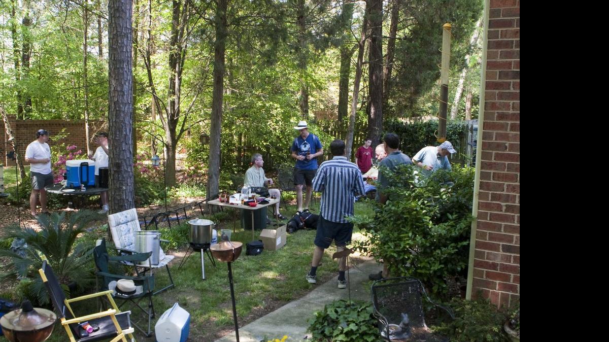 
A backyard brew session of the Carolina BrewMasters club at the home of Tom Henderson. During the course of the day –about a six to seven hour brewing session – a few dozen people dropped by to sample and share some homebrews and commercial beers. 
