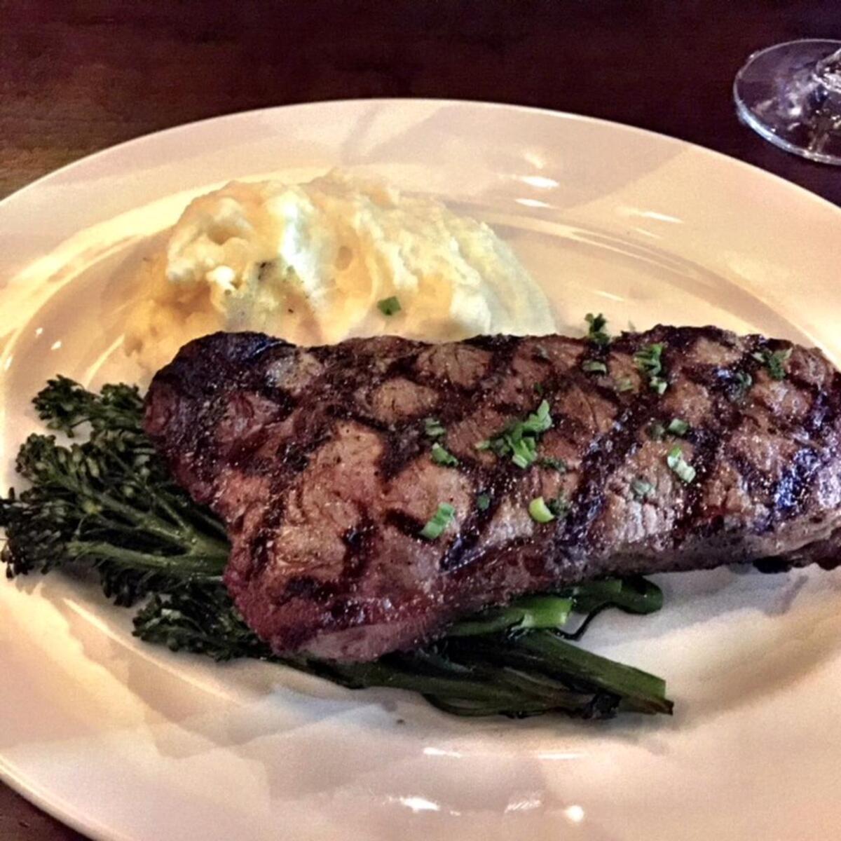 South Park Grill’s 14-ounce center-cut New York Strip is $37. Unlike other pricier steaks, it does come with potatoes and broccolini.