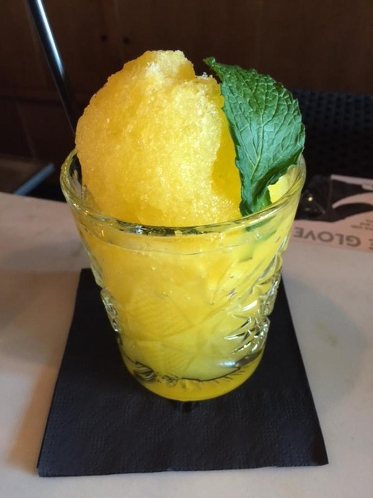 El Machete is a smoky/fruity mix of mezcal and juice over shaved ice.