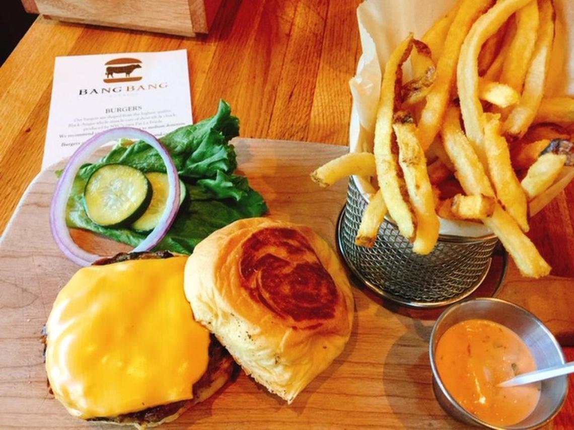 Bang Bang’s cheeseburger is a well-seasoned patty, cheese, house sauce and fries.