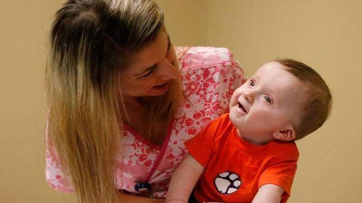 
Triton Ayers receives physical therapy from Carrie Tomeck at Piedmont Medical Center in Rock Hill.

