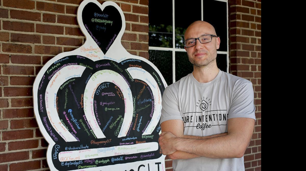 
Garrett Tichy of #WeLoveClt at a meet up he hosted Wednesday, June 18. 2015. 
