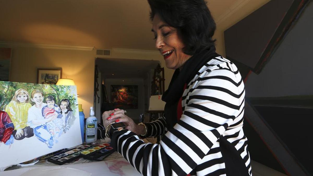 
Jean Dickow wears a Lively Safety Watch in Oakland, Calif., July 23, 2015. Dickow was persuaded to put on an Apple Watch look-alike called the Lively safety watch, which has an alert button to push if she falls. Devices that monitor vital signs and remind people to take medicine can help older people stay in their homes longer and more cheaply. 
