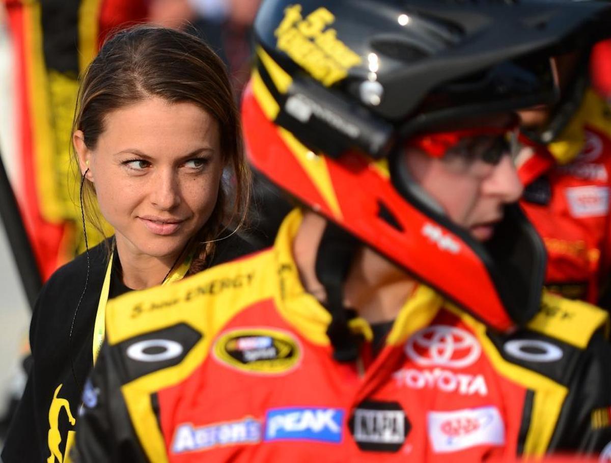 Christmas Abbott watches as crew members work in NASCAR Cup series driver Clint Bowyer’s pit during the Budweiser Duel at Daytona International Speedway on Feb. 21, 2013.