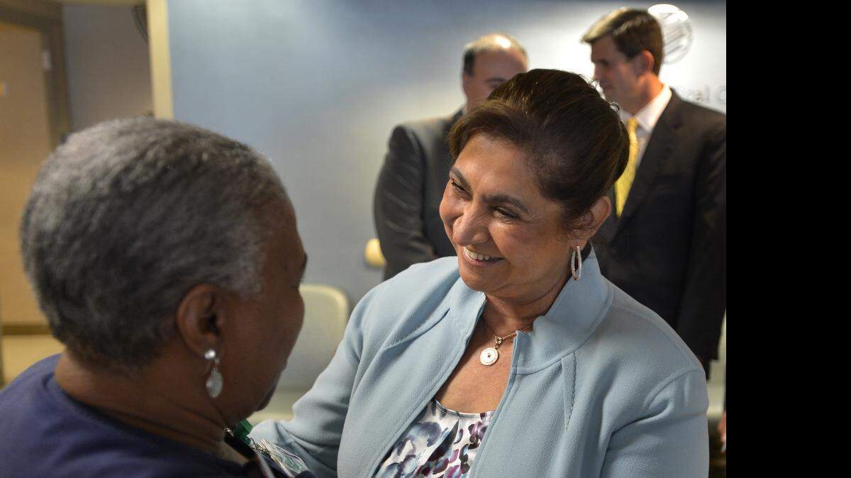 
The first lady of Guatemala, Rosa Mar’a Leal de Pérez, is greeted by Marie Dambreville, a health care technician, during a tour of Carolinas Medical Center’s emergency department.
