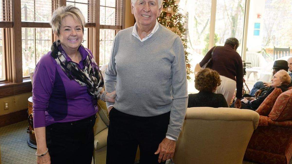 John Moore and Lynn Ivey at The Ivey, an adult day care center in Charlotte. Moore has bought land for the Ivey and has made other investments that it put in strong shape for a possible expansion. A side benefit, Moore and Ivey fell in love.