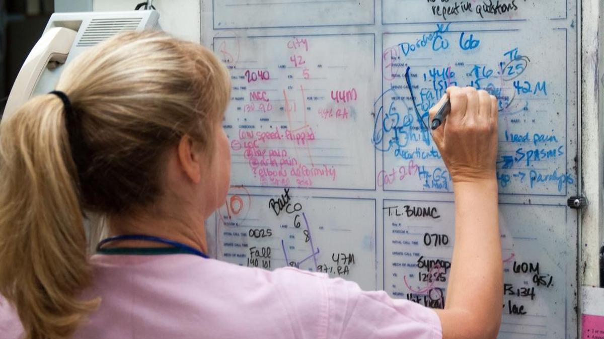 More calls are coming in, and the board is filling up with patients.