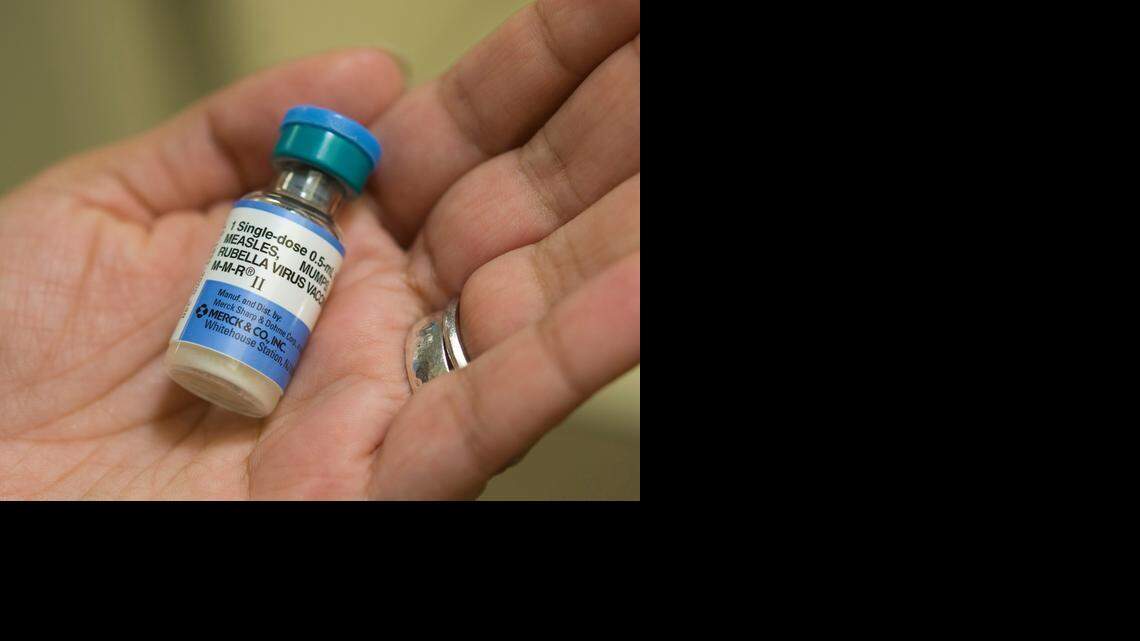 
Dr. Shruti K. Gohil, associate medical director for epidemiology and infection prevention at UCI Medical Center, holds a dose of MMR, the vaccine against measles, mumps and rubella. 
