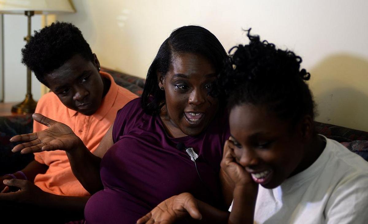 Jnelle Dean with her children Jmiel, left, and Naima.