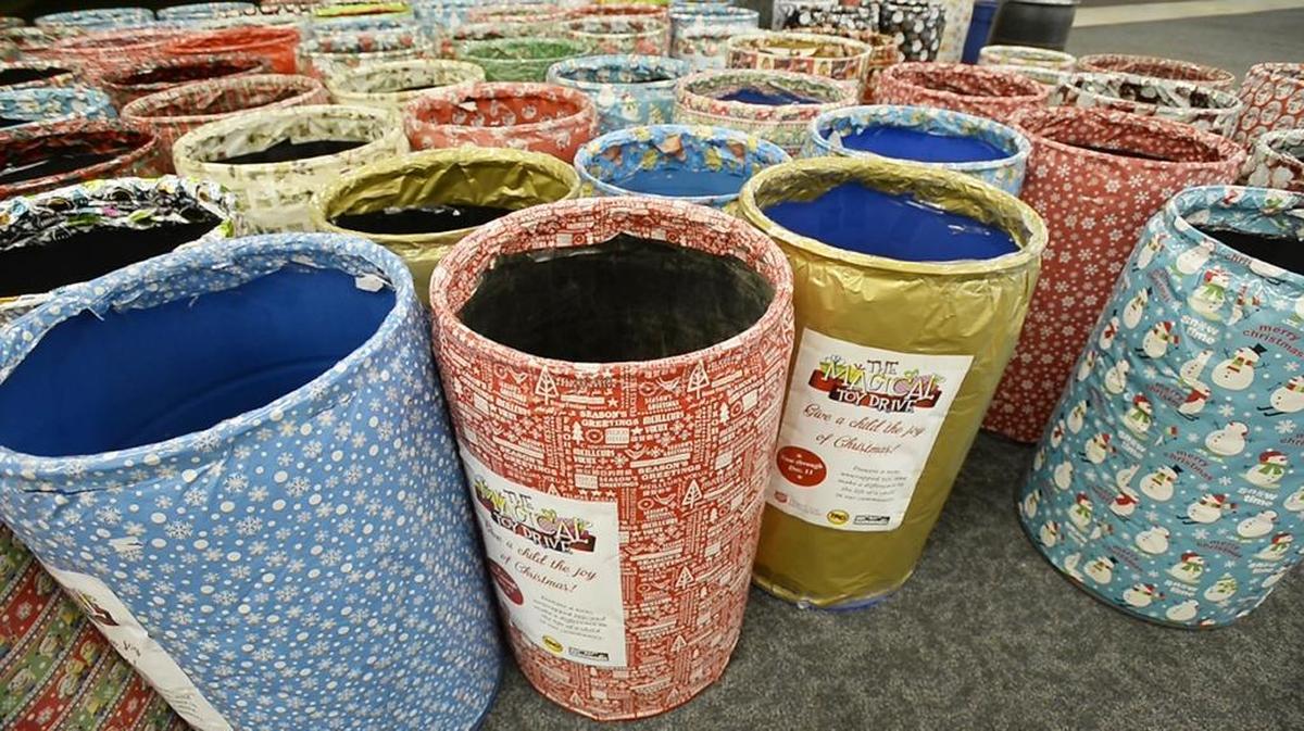 Barrels at the Salvation Army’s Christmas Bureau are wrapped and ready to be used to collect toys.