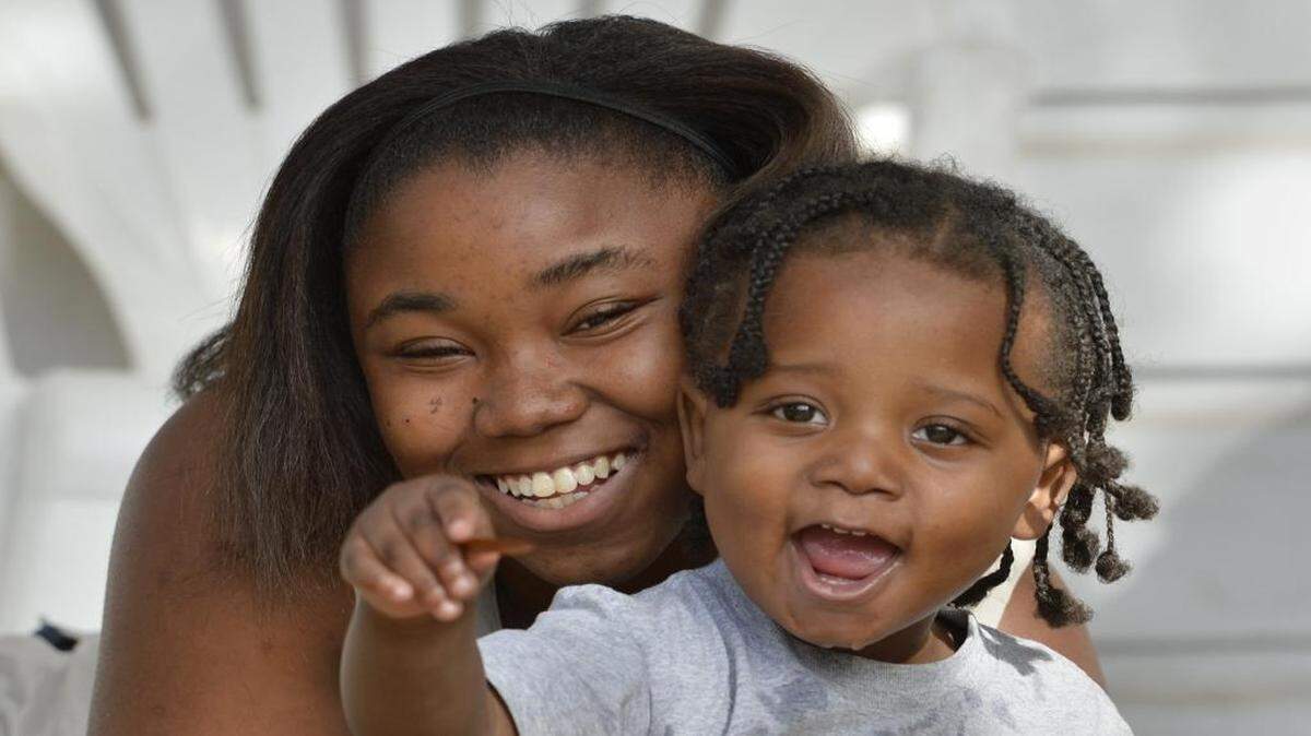 Jasmine Bennett with her son, 1-year-old Cameron Bennett. Jasmine has enrolled for help from the Salvation Army for Christmas toys.