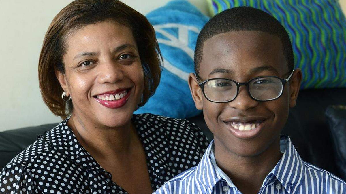 Tracie Sutton, a single mom and homeowner, has gone to the Salvation Army for help with Christmas gifts for her son, Justin Sutton, 12.