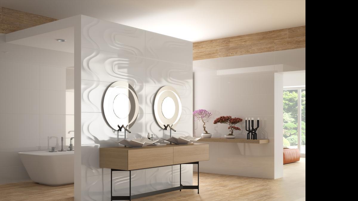 
Saloni’s Vantage Drip white and black tiles beg for a full wall with which to exercise their design potential.

