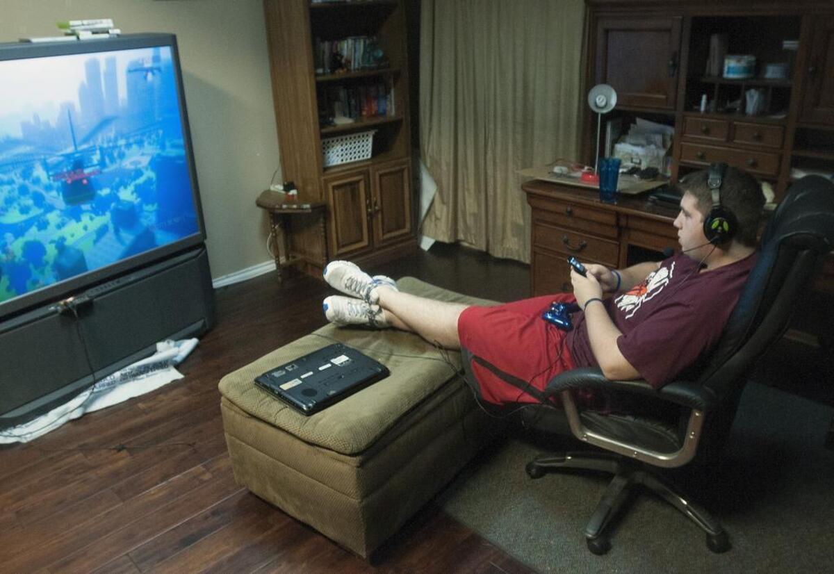 Looking at TV, laptop and cellphone screens right before going to bed can be detrimental, sleep expert says.