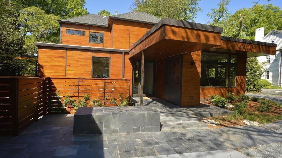 Architect Stan Russell converted a Myers Park traditional home to this contemporary dwelling. It's evident in the homes he designs for clients -- and in his "all-in" approach.