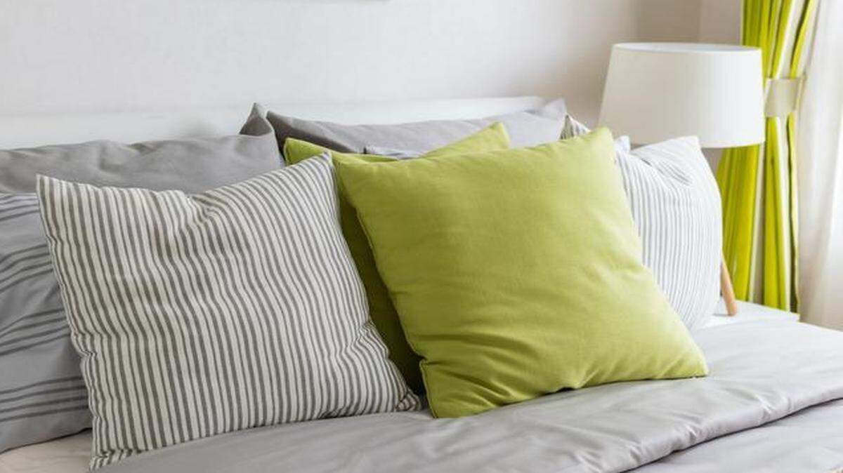 
Freshen up your room with brightly colored pillows and curtains.
