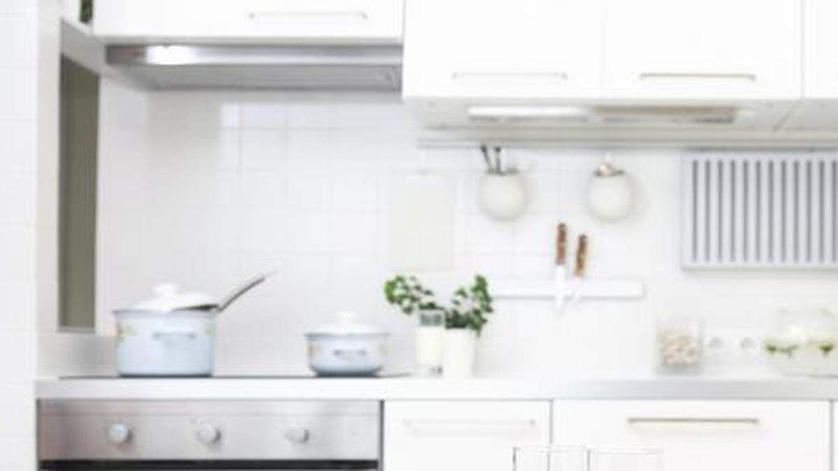 
Make your kitchen appear larger with a monochromatic color scheme.

